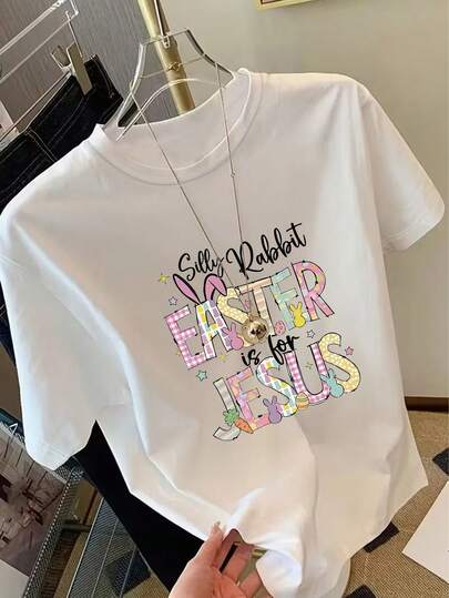 Women's Casual Easter Themed T-Shirt With Handwritten "Silly Rabbit" Text, Colorful Plaid, Stripe, Polka Dot Patterns, "Easter Belongs To Jesus" Slogan, And Illustrations Of Colored Rabbits, Eggs, Carrots And Stars, Round Neck Short Sleeve, Suitable For Spring, Summer, Autumn