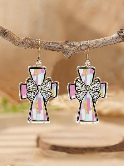 这款色彩缤纷的十字蝴蝶结耳坠为女性增添了一丝时尚魅力，是夏季珠宝的完美之选——非常适合海滩度假和派对。