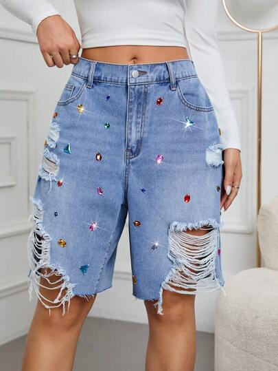 女士休闲棉质口袋水钻毛边水洗破洞牛仔短裤，街头风，适合春、夏、秋季穿着。