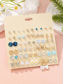 1 set de 30 paires de boucles d'oreilles mignonnes et à la mode avec motifs de petites marguerites, cœurs et étoiles. Un ensemble de boucles d'oreilles raffinées convenant aux sorties quotidiennes et occasions décontractées pour les femmes. - Multicolore - Voir 1