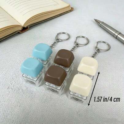 一款简约优雅的纯色圆形帽子钥匙扣，是完美的钥匙配饰。