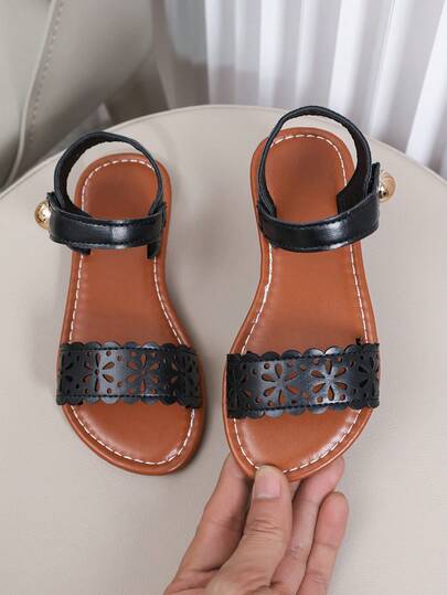 1 Pair Black Hollow Floral Pattern Toddler Girls' Sandals, Non-Slip Rubber Soft Bottom, Hook And Loop Design Round Toe, Fashion Children Flat Sandals Suitable For 3-15 Years Old Girls, Daily, Travel, Home, Party Wear, 2026 Spring/Summer New