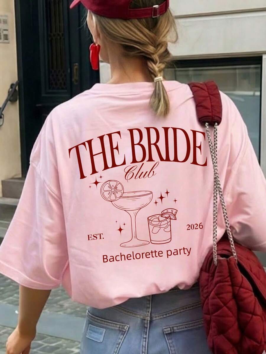 1 Áo thun nữ tay ngắn cổ tròn mùa hè, in họa tiết "THE BRIDE, EST. 2026", kiểu dáng rộng rãi, thoải mái, đa năng. Thích hợp cho mùa hè, đi biển, dạo phố, mặc hàng ngày, đi làm, tiệc văn phòng, đi chơi, lễ hội, liên hoan âm nhạc, ngày Valentine, các dịp tiệc tùng. - Hồng - Xem 1