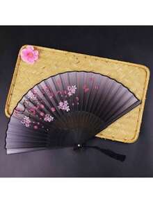 2026新款 - 畅销款 - 1件装。这款复古风格的竹制折扇采用ABS塑料（ABS树脂）制成，饰有樱花图案，颜色由黑渐变至紫色，并带有流苏细节，是中国传统汉服舞蹈配饰，也是一款女士便携式扇子、装饰礼品，非常适合毕业季使用。 - 復古扇子 - 查看 3