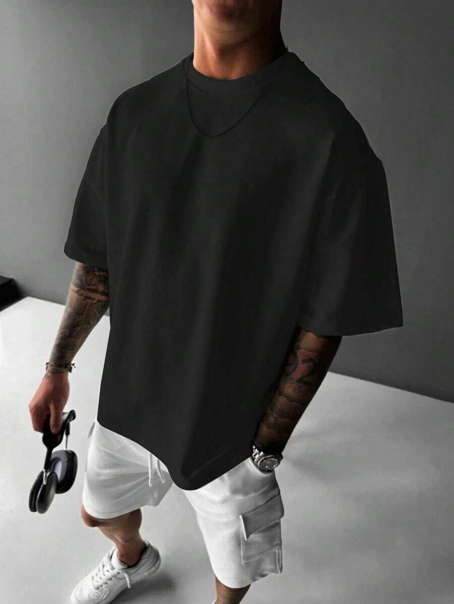 Camiseta casual de manga corta de cuello redondo sólida y holgada para hombre, para uso diario en verano - Negro - Ver 1
