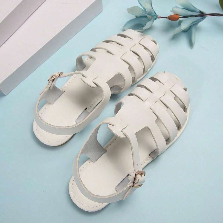 1 đôi dép xăng đan đế bằng, khoét lỗ, mũi kín, kiểu dáng thường ngày dành cho nữ tuổi teen, thích hợp đi biển. - trắng - Xem 1