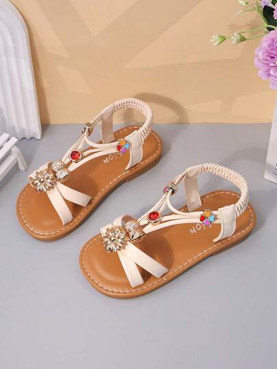 1 Pair Girls' Beige Flat Sandals, Solid Soft PU Criss-Cross Strap + Shiny Crystal & Red Agate Decor, Round Toe Soft Non-Slip Slip-On Design, Fashionable Cute Bohemian Beach Sandals, Suitable For Casual, Beach, School, Dance, Spring/Summer