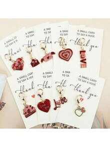 9件/18件红色心形钥匙扣套装，附赠爱心小礼物，是送给女友/男友的理想礼物，也适合作为周年纪念、祝福、生日、派对小惊喜礼物。套装包含吊坠，也是母亲节、父亲节的感恩礼物。 - 彩色 - 查看 3