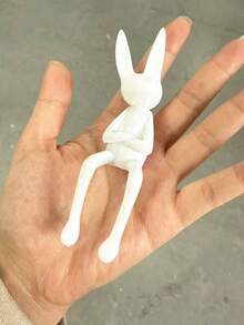 1 pieza Figura de conejo de Pascua de plástico en posición relajada sentada, adecuada para decorar la sala de estar, estantería, mesa de noche y escritorio, sin necesidad de fuente de alimentación - Blanco - Ver 10