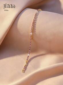 Hihho 1 chiếc vòng tay dây xích tennis cầu vồng cao cấp, phụ kiện mang đến cảm giác thư thái, năng động cho cả đi làm và hẹn hò, sang trọng, đậm chất Dopamine, phong cách dự tiệc. Sự kết hợp giữa nền vàng và đá Zirconia nhiều màu sắc phù hợp với mọi tông da, có thể phối cùng vest, áo sơ mi để tạo vẻ ngoài thanh lịch khi đi làm, hoặc váy, áo hai dây để tạo vẻ ngoài sang trọng cho các bữa tiệc/sự kiện. Một phụ kiện hot cho mùa xuân/hè. - Vòng tay tennis - Xem 14
