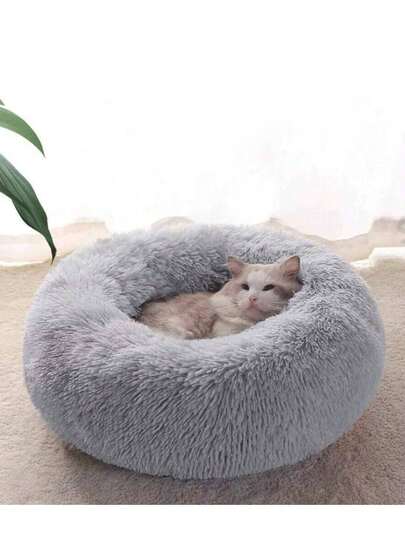 1个柔软毛绒宠物床，舒适保暖，适合猫狗，双面设计，四季皆宜，可机洗，宠物舒适窝