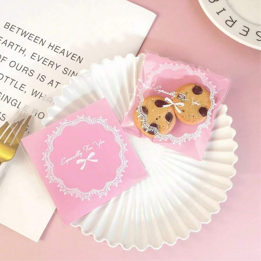 100/200 Túi quà in hình nơ màu hồng/xanh dương, thích hợp cho các dịp như tiệc mừng em bé chào đời, đám cưới, kỷ niệm, lễ tốt nghiệp và tiệc sinh nhật. - Xem 1