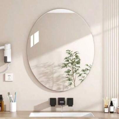 A High-Quality Frameless Acrylic Oval Bathroom Mirror Wall Sticker, Featuring A Wall-Mounted Self-Adhesive High-Definition Mirror Surface That Is Waterproof And Moisture-Resistant. It Comes With A Removable Protective Film And A Plastic Surface, Making It Versatile And Requiring No Power Supply. Ideal For Decorating Beautiful Spaces Such As Bathrooms, Living Rooms, Bedrooms, Kitchens, And Offices.