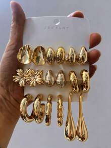 3-9对奢华自然风黄金耳环套装，饰以优雅的竹节、浪漫的枫叶和灵动的水滴。每对耳环都散发着独特的自然魅力，适合全年各种场合佩戴。稀有而别致，佩戴它们，让你成为众人瞩目的焦点。 - 金色 - 查看 8