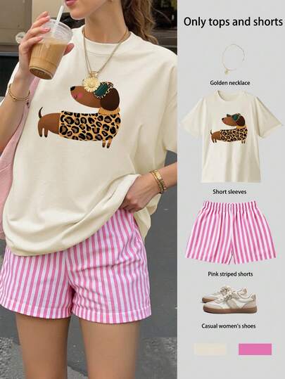 Bộ đồ thường ngày gồm áo tay ngắn dáng rộng in hình chó xúc xích và quần short kẻ sọc, phong cách đường phố thẩm mỹ phương Đông 2026, áo phông in hình thỏ Phục Sinh trừu tượng, trang phục đi học năm 2026, cảm hứng phong cách học đường, đồ cần thiết cho năm học mới, trang phục ngày đầu tiên đi học, những bộ trang phục đi học năm 2026.