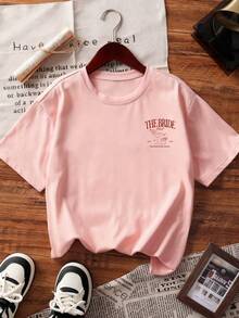 1 Áo thun nữ tay ngắn cổ tròn mùa hè, in họa tiết "THE BRIDE, EST. 2026", kiểu dáng rộng rãi, thoải mái, đa năng. Thích hợp cho mùa hè, đi biển, dạo phố, mặc hàng ngày, đi làm, tiệc văn phòng, đi chơi, lễ hội, liên hoan âm nhạc, ngày Valentine, các dịp tiệc tùng. - Hồng - Xem 2