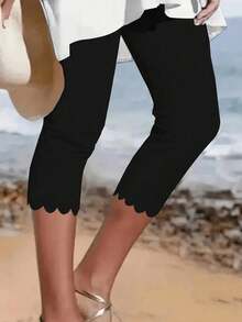 Quần legging lửng nữ màu đen co giãn cao, có viền bèo nhún, thoải mái và thời trang. - màu đen - Xem 1