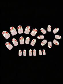 24片裸色草莓造型美甲贴纸，短款椭圆形可爱假指甲，柔和裸色底色搭配甜美草莓图案。白色花朵设计，适合所有季节（春、夏、秋、冬），亚克力材质，短款椭圆形，通勤、春季郊游、花园派对等场合的理想之选，亮面设计 - 彩色 - 查看 4