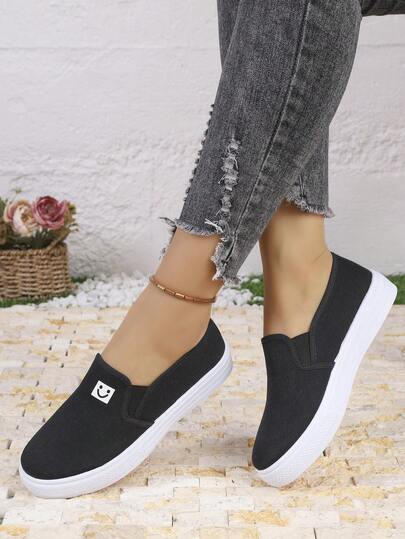 Giày thể thao nữ casual, màu đen, kiểu dáng tối giản châu Âu và Mỹ, chất liệu vải canvas, đế dày, thích hợp cho đi làm hàng ngày, mua sắm, hoạt động ngoài trời, đa năng.