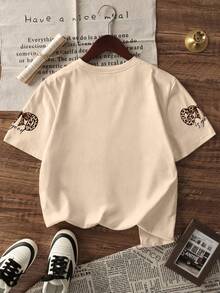 两件套女童休闲套装，包含一件印有“上帝是仁慈的”标语和豹纹蝴蝶结图案的T恤，搭配豹纹喇叭裤，适合返校、外出、日常休闲穿着，夏季皆宜。 - 彩色 - 查看 5