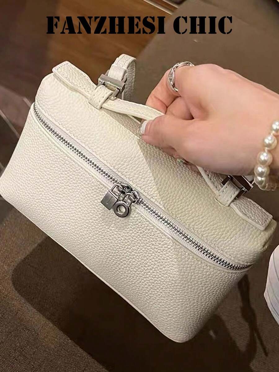 Esta bolsa de tote de color blido presenta un diseño con cremallera ligero y portátil. Su diseño elegante y versátil la hace perfecta para el transporte diario, los viajes y las compras. - Blanco - Ver 1