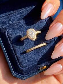 一套925纯银优雅高端单排水滴形钻石戒指套装，适合女性日常佩戴、生日派对、求婚仪式和周年纪念日。 - 白鑽-金 - 查看 1