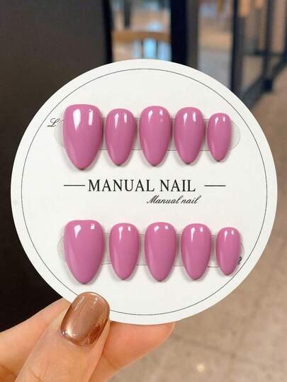 JUTI 10 Handmade Short Almond-Shaped Press-On Nail Stickers, In Solid Rose Pink With A Glossy Finish For A Clean, Eye-Catching Look, Featuring A Sharp-Tip Design. They're Hand-Painted With A Smooth Glossy Coating, Showcasing These Minimalist Elegant Nails. Characterized By A Clean, Sophisticated, Stylish, And High-Quality Aesthetic, These Nails Suit Both Mature And Youthful Styles, Work For Any Occasion, And Are Easy-To-Remove Press-On Nail Stickers.