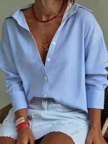 Áo sơ mi nữ kẻ sọc xanh nhạt thanh lịch, tay dài dáng rộng, thích hợp cho mùa hè đi biển, công sở và mặc hàng ngày vào mùa xuân. - Xanh và trắng - Xem 3
