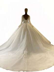 Luxury Long Sleeve V-Neck Ball Gown Wedding Dress With Crystal Beading, Tulle Skirt, And Cathedral Train – Premium Lace And Tulle With Hand-Applied Crystal Embellishments, Fitted Bodice With Boning, V-Neckline With Illusion Lace, Cathedral Train With Lace Edging, Available In Ivory – Perfect For Fall/Winter Indoor Weddings, Palace Ceremonies, And Destination Weddings, Warm And Elegant Design, Ideal For Cooler Weather, International Export Quality, Suitable For Global Bridal Market - trắng - Xem 4