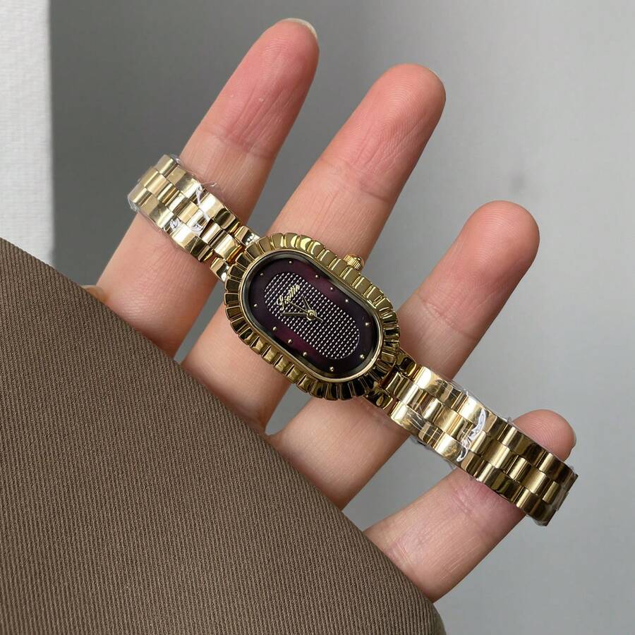 1 chiếc đồng hồ đeo tay hình oval lượn sóng, phong cách retro Pháp, dây đeo thép mạ vàng + mặt số kẻ caro màu đỏ tía, thời trang nữ thành thị độc đáo. - Vàng - Xem 1