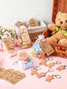 Bộ quà tặng tri ân 10 món, bao gồm 10 móc khóa hình gấu bông, 10 thiệp cảm ơn và 10 túi quà, thích hợp làm quà tặng cho hoạt động xây dựng đội nhóm, nhân viên văn phòng, tình nguyện viên, y tá, giáo viên và quà tặng nghỉ hưu. Bộ quà tặng tri ân đầy cảm hứng với những tấm thiệp cảm ơn, móc khóa và túi quà ý nghĩa để bày tỏ lòng biết ơn, lý tưởng làm quà tặng khách, quà tặng nhỏ trong tiệc sinh nhật, đồ dùng cho tiệc tốt nghiệp và quà tặng nhỏ trong các bữa tiệc. - Gấu hình trái tim - Xem 4