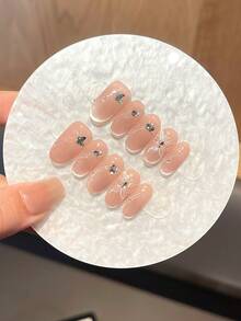 10片高品质手工按压式粉色猫眼美甲贴，手绘可爱蝴蝶闪亮钻石白珍珠图案，适合气质温柔的女士和女孩在日常舞会等场合佩戴。附赠可拆卸美甲贴、果冻胶和摩擦条。 - 彩色 - 查看 6