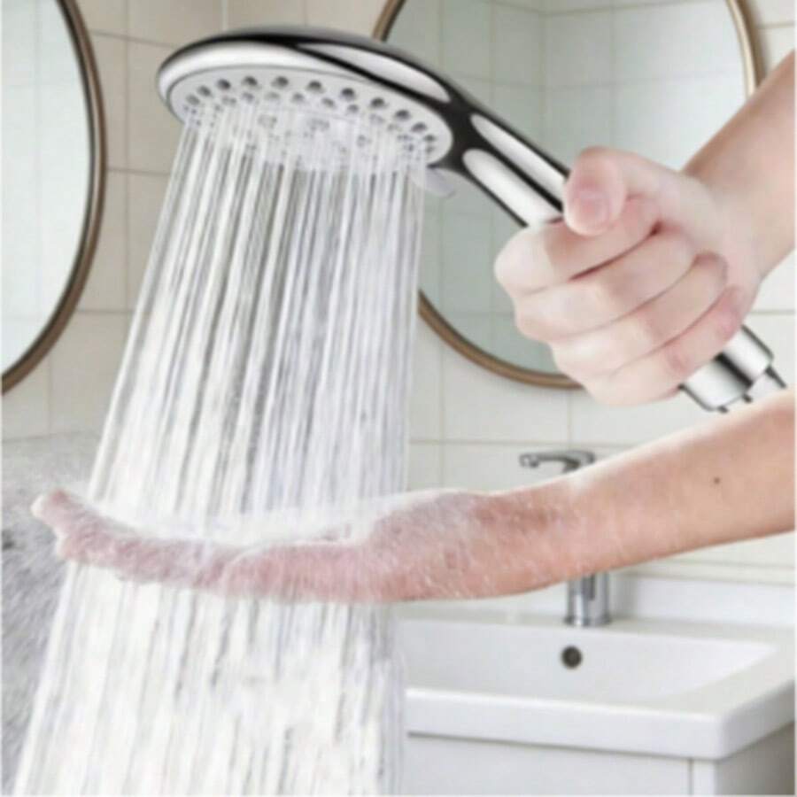 Bộ 1 vòi sen cầm tay có chức năng điều chỉnh lưu lượng nước, bao gồm giá đỡ và dây dẫn, vòi sen phòng tắm, đầu vòi sen, phụ kiện phòng tắm, và các vật dụng cần thiết cho phòng tắm. Tận hưởng trải nghiệm tắm thư giãn sang trọng. - Bộ vòi sen T934 - Xem 1