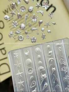 1个法式奶油色裙边美甲模具，3D硅胶模具，适用于树脂工艺品，哥特蛋糕蕾丝裙边奶油色条纹蝴蝶结图案；1个贝壳美甲模具，3D海洋风格贝壳和海星美甲硅胶模具，海洋主题美甲硅胶模具 - 彩色 - 查看 4