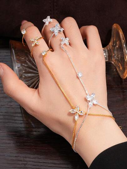 Dây đeo ngón tay hình hoa kiểu dáng đơn giản và thời trang với thiết kế độc đáo - Một phụ kiện ngọt ngào cho đôi tay của bạn.