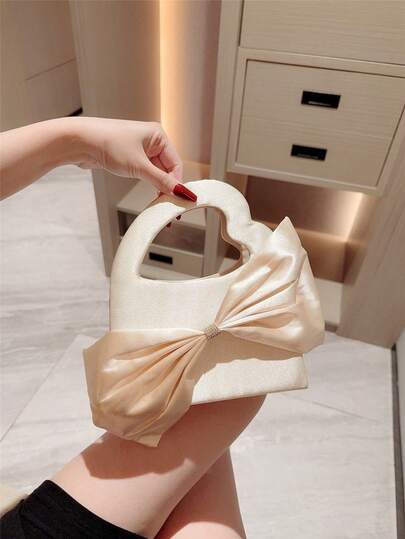 Moonlit Eve Bag - A Gentle Apricot-Colored Satin Handbag For Women. Elegant Bow Decoration, Suitable For Formal Evening Parties, Weddings, And Other Formal Occasions.