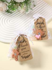 Bộ quà tặng tri ân 10 món, bao gồm 10 móc khóa hình gấu bông, 10 thiệp cảm ơn và 10 túi quà, thích hợp làm quà tặng cho hoạt động xây dựng đội nhóm, nhân viên văn phòng, tình nguyện viên, y tá, giáo viên và quà tặng nghỉ hưu. Bộ quà tặng tri ân đầy cảm hứng với những tấm thiệp cảm ơn, móc khóa và túi quà ý nghĩa để bày tỏ lòng biết ơn, lý tưởng làm quà tặng khách, quà tặng nhỏ trong tiệc sinh nhật, đồ dùng cho tiệc tốt nghiệp và quà tặng nhỏ trong các bữa tiệc. - Gấu hình trái tim - Xem 10