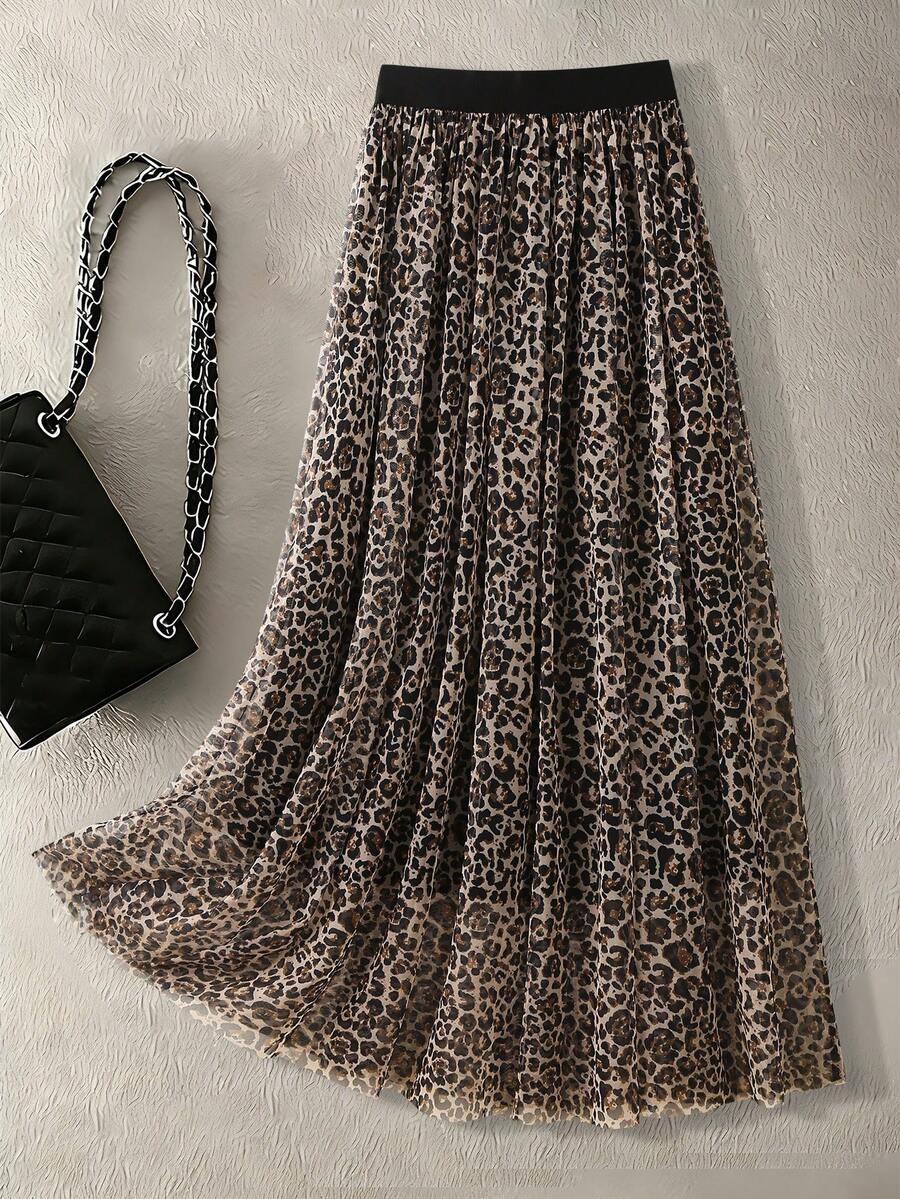 女士优雅休闲时尚豹纹A字长裙，采用涤纶面料，喇叭裙摆，尽显优雅气质。适合日常出行和春季度假穿着。 - 摩卡棕 - 查看 1