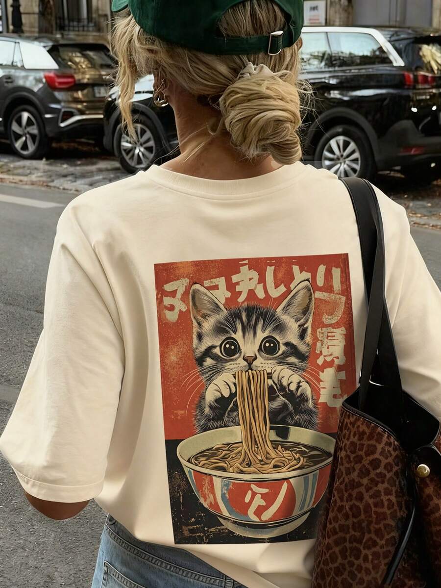 Camiseta de manga corta de cuello redondo casual con estilo de gato japonés minimalista y divertido comiendo fideos, top de mujer de moda y versátil - Albaricoque - Ver 1