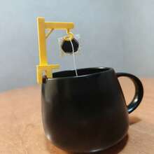 1个十字形茶包架，可轻松挂在杯子上（适用于3-5毫米厚的杯子），使茶包均匀浸泡。实用小工具 - 黃色 - 查看 2