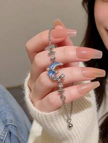 1 chiếc vòng tay điều chỉnh được thiết kế độc đáo hình trăng sao xanh dương. - Nhiều màu - Xem 2