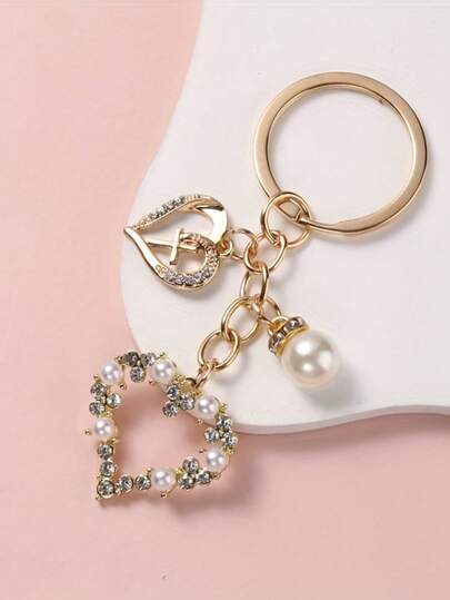 Móc khóa ngọc trai hình trái tim cho ngày Valentine, phụ kiện hình trái tim, phụ kiện ngọc trai, phụ kiện đính đá, phụ kiện dây chuyền, phụ kiện vàng, phụ kiện hợp kim, phụ kiện túi xách nữ, phụ kiện ví, phụ kiện túi xách, trang trí ba lô, quà tặng ngày lễ, quà tặng ngày Valentine, quà tặng lễ Phục sinh, quà tặng bạn thân, phụ kiện xe hơi lãng mạn và đẹp mắt