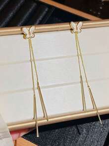 一对优雅奢华的金色蝴蝶流苏耳环，适合女性日常、节日和派对佩戴。 - 蝴蝶型 - 查看 3