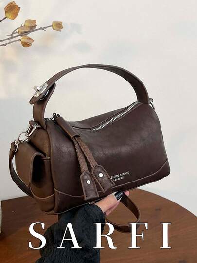 This Pillow-Shaped, Stylish Retro Women's Handbag Features A Long Material Strip Zipper Pull. A Retro-Chic Style Bag That Showcases Individuality, It's Suitable For Carrying Medium-Sized Items. It Can Be Worn On The Shoulder Or Carried By Hand. Made Of High-Quality, Wear-Resistant, Waterproof, And Scratch-Resistant PU Material