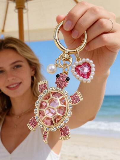 Llavero con dije de tortuga marina con diseño de perla y corazón, llavero de aleación de zinc inspirado en el océano para hombres y mujeres, ideal para el Día de San Valentín, el Día de la Madre, el Día del Padre, el Día de la Independencia, amantes de la playa, llavero lindo y duradero para bolsos, accesorios de coche, regalos para amigos y familiares, colgante de animal marino con strass