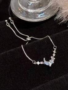 1 chiếc vòng tay điều chỉnh được thiết kế độc đáo hình trăng sao xanh dương. - Nhiều màu - Xem 3