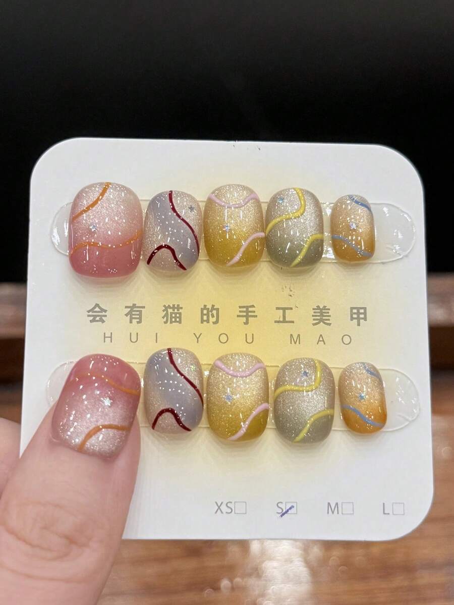 Set de 10 uñas postizas con arte de uñas, líneas de colores, ojos de gato pintados a mano dulces y frescos, arte de uñas con forma de frijol dulce y vivo soñador, accesorios de uñas hechos a mano - Multicolor - Ver 1
