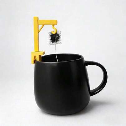 1 حامل لكيس الشاي (بتصميم على شكل صليب)، مناسب للتعليق بسهولة على الكوب، يسهل نقع أكياس الشاي بالتساوي. أداة صغيرة عملية