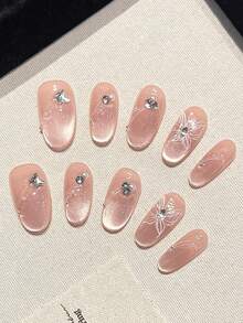 10片高品质手工按压式粉色猫眼美甲贴，手绘可爱蝴蝶闪亮钻石白珍珠图案，适合气质温柔的女士和女孩在日常舞会等场合佩戴。附赠可拆卸美甲贴、果冻胶和摩擦条。 - 彩色 - 查看 3