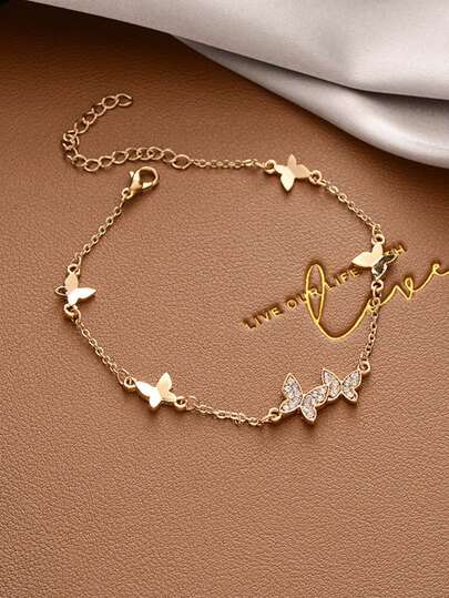 1 件蝴蝶水钻手链，采用精致的蝴蝶造型设计，饰以闪亮的水钻，打造优雅妩媚的气质，适合日常佩戴或特殊场合。